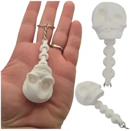ruchomy-brelok-czaszka-kregoslup-gadzet-antystresowy-bialy