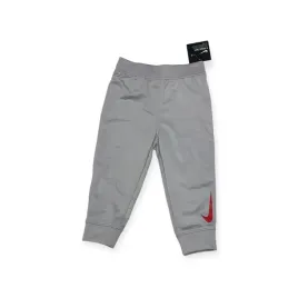 spodnie-dresowe-szare-dla-chlopca-nike-18-msc