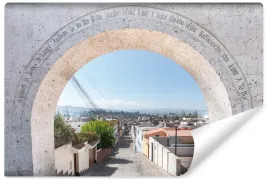 fototapeta-do-salonu-widok-z-kamiennej-bramy-na-miasto-uliczka-3d-450x300
