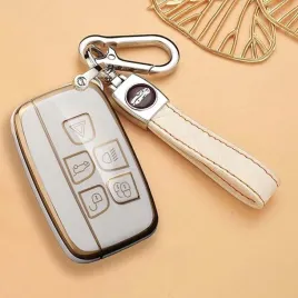 smart-etui-na-kluczyk-samochodowy-bialo-zlote-dla-kobiety-z-brelokiem