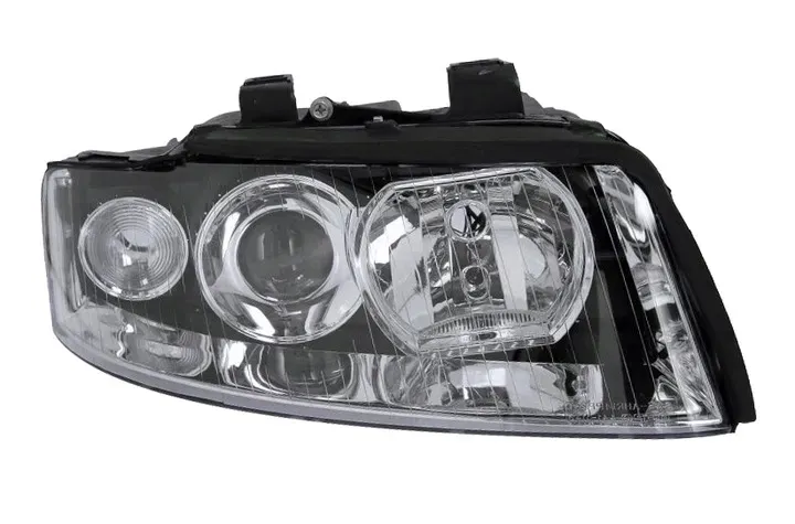 REFLEKTOR LAMPA PRZÓD AUDI A4 B6 00-04 PRAWY TYC