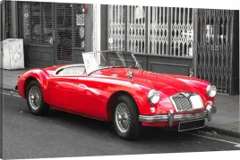 obraz-na-plotnie-czerwony-samochod-cabrio-100x70