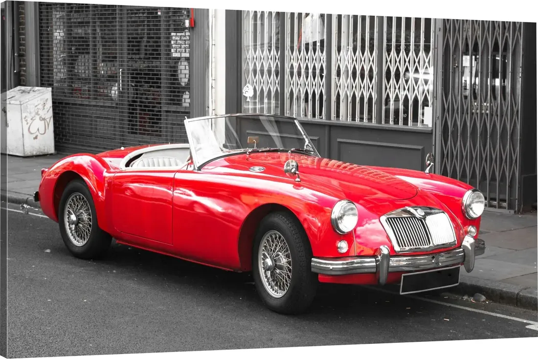 obraz-na-plotnie-czerwony-samochod-cabrio-100x70