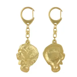 bernardyn-pies-sw-bernarda-pozlocony-brelok-do-kluczy-z-psem-w-pudelku