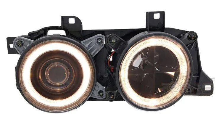reflektory-lampy-przednie-bmw-e34-black-ringi-stan-nowy