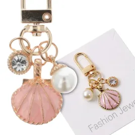 zawieszka-brelok-do-kluczy-plecaka-muszelka-roz