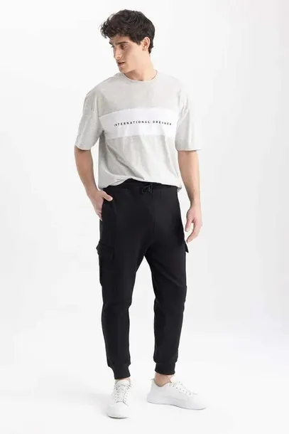 czarne-klasyczne-luzne-spodnie-dresowe-kieszenie-gumka-defacto-m-wiek-dziecka-0