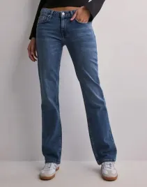 nelly-niebieskie-spodnie-jeans-yku-ng5-m