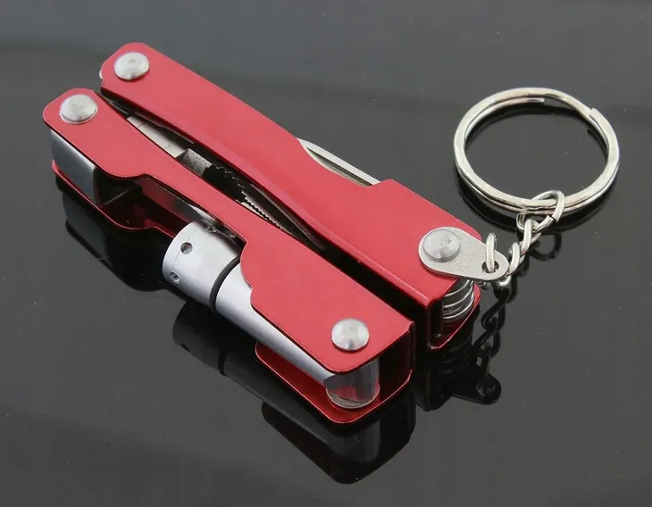 ag486a-mini-multitool-brelok-6w1-stan-nowy-cechy-dodatkowe-futeral-kolko-do-kluczy-lampka-led-mozliwosc-otwierania-jedna-reka