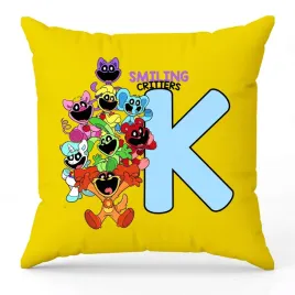 poduszka-ozdobna-zolta-smiling-critters-monogram-litera-k-na-prezent-wzory