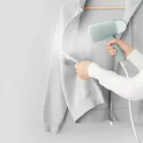 steamer-do-ubran-parownica-reczna-tefal-origin-dt1034-1200w-mocna-skladana-cechy-dodatkowe-blyskawiczne-nagrzewanie-w-25-sekund-wyjmowany-zbiornik-na-wode-efektowny-design-wygodne-uzytkowanie-haczyk-dla-latwego-przechowywania