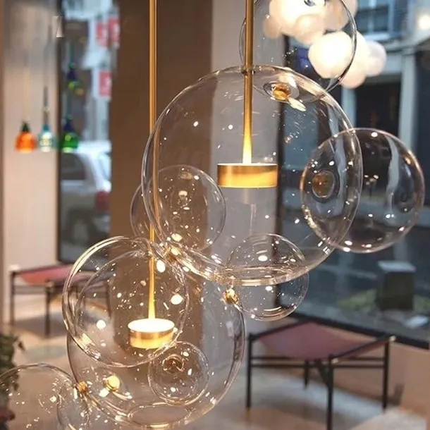 lampa-wiszaca-duza-do-salonu-glamour-bubble-banki-kule-led-zlota-app650-dlugosc-wysokosc-68-cm