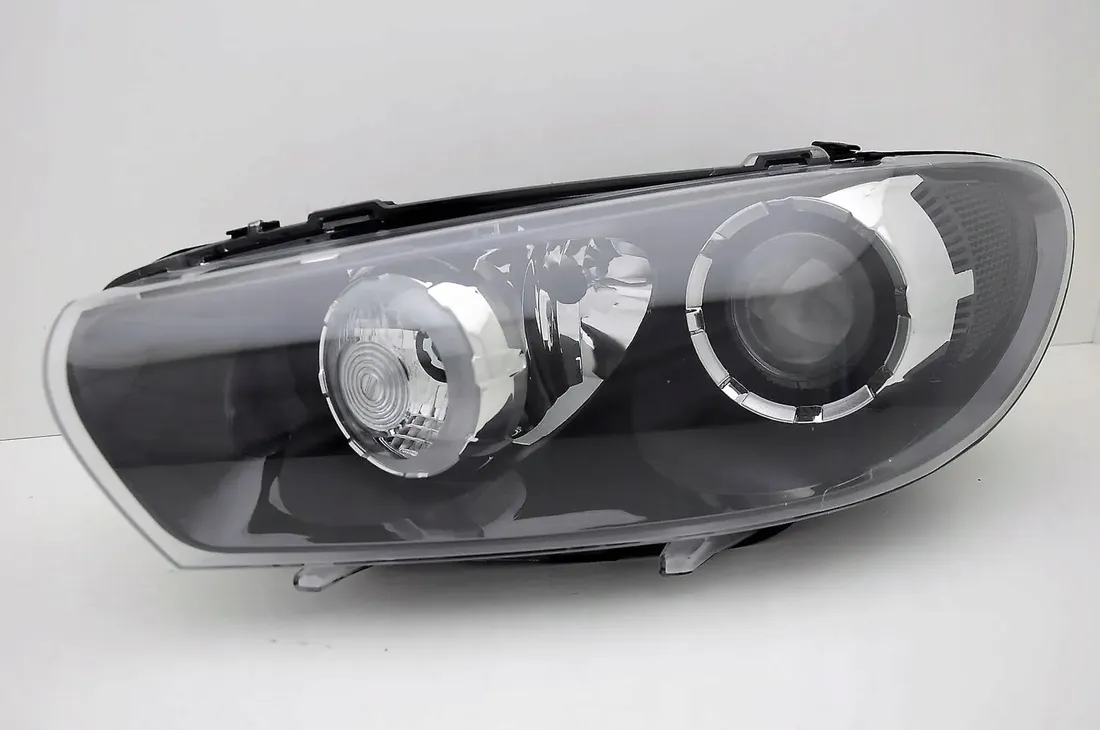 vw-scirocco-08-14-reflektor-xenon-lewy-depo
