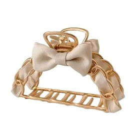 spinka-do-wlosow-klamra-metalowa-przeplatana-kokarda-xl-8cm-sp261k