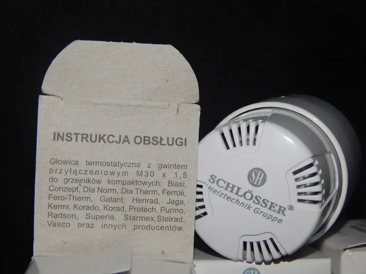 glowica-schlosser-600100030-stan-nowy-kolor-bialy