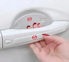 przezroczyste-naklejki-pod-klamki-drzwi-samochodu-mazda-z-logo-8-sztuk