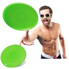 frisbee-latajacy-dysk-talerz-na-plaze-zielony