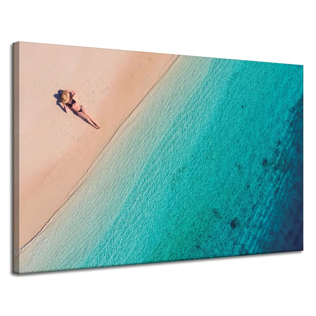 obraz-na-plotnie-kobieta-opalajaca-sie-na-plazy-120x80-cm-stan-nowy