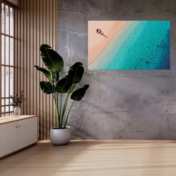 obraz-na-plotnie-kobieta-opalajaca-sie-na-plazy-120x80-cm-material-wykonania-plotno