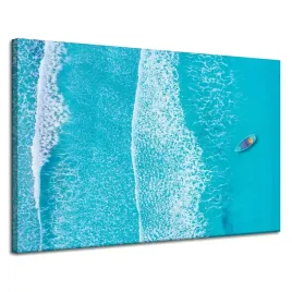 obraz-na-plotnie-niebieska-lodka-fale-woda-ocean-120x80-cm
