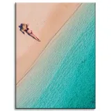 obraz-na-plotnie-kobieta-opalajaca-sie-na-plazy-30x40-cm-stan-nowy