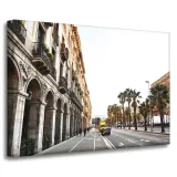 obraz-na-plotnie-miasto-architektura-70x50-cm-zabudowania-widok-palmy-droga