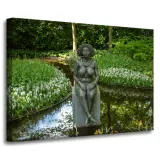 obraz-na-plotnie-architektura-rzezba-kobiet-70x50-posag-kobiety-w-naturze