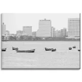 obraz-na-plotnie-architektura-lodki-miasto-70x50-czarno-bialy-zabudowania-stan-nowy