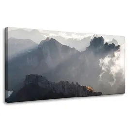 obraz-na-plotnie-natura-gory-w-chmurach-80x40-cm-szczyt-skaly-promienie