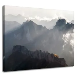 obraz-na-plotnie-natura-gory-w-chmurach-100x80-cm-szczyt-skaly-promienie