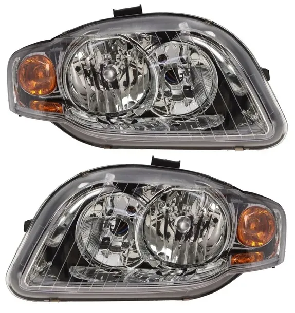 REFLEKTORY LAMPY AUDI A4 B7 04-06 TYC KOMPLET + SILNICZKI