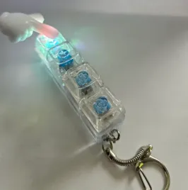 swiecacy-kliker-led-fidget-toy-antystresowy-klikacz-brelok-bialy