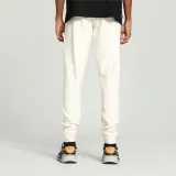 puma-spodnie-m-better-essentials-sweatpants-beige-kolor-bezowy