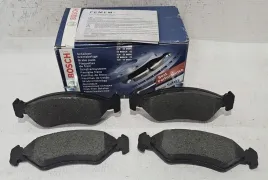 nowe-bosch-klocki-hamulcowe-przod-ford-fiesta-iii-3-iv-4-ka-mazda-121-iii-3