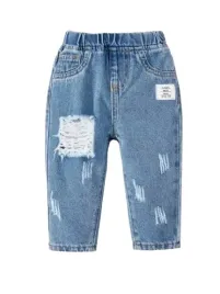 shein-spodnie-jeansowe-z-dziurami-chlopiece-niebieskie-86-1ah