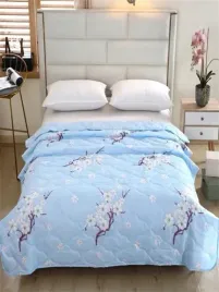 shein-narzutka-niebieska-w-kwiatki-na-lozko-pikowana-100x150-luk