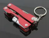 ag486a-mini-multitool-brelok-6w1-stan-nowy-cechy-dodatkowe-futeral-kolko-do-kluczy-lampka-led-mozliwosc-otwierania-jedna-reka