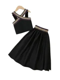 shein-czarny-komplet-top-z-krzyzowanymi-ramiaczkami-i-spodnica-104-110-1df