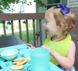 silikids-sliniak-silikonowy-z-kieszonka-lime-zapiecie-guziki