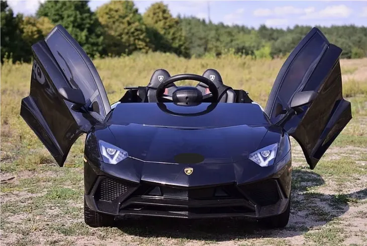 samochod-lamborghini-pomaranczowy-marka-lamborghini-wiek-dziecka-12-m