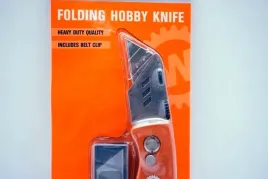 werckmann-noz-skladany-z-ostrzem-trapezowym-orange