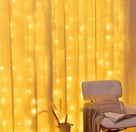 kurtyna-swietlna-led-na-okno-choinke-firanke-girlanda-lampki-sople-pilot