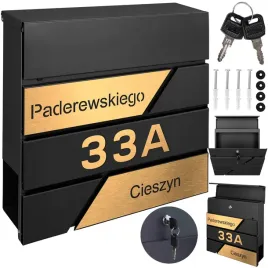 czarna-skrzynka-na-listy-ze-zlotym-adresem-wykonanym-z-grawerem-obejmujacym-ulice-napis-i-numer-domu