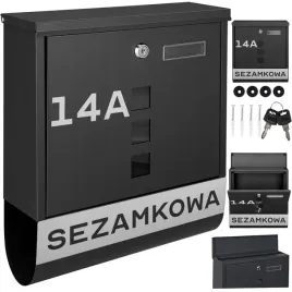 czarna-skrzynka-pocztowa-w-designie-tuby-przeznaczona-na-listy-i-poczte