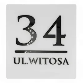 nowoczesna-tabliczka-adresowa-z-numerem-domu-i-nazwa-ulicy-wykonana-w-bialym-macie-z-czarnymi-elementami-3d