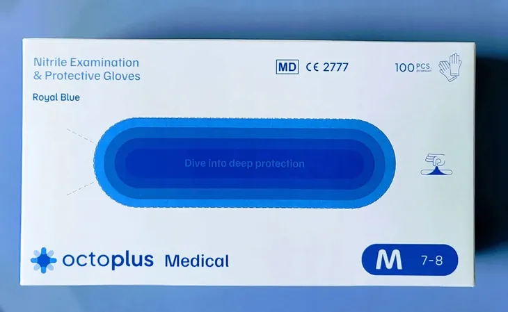 RĘKAWICZKI RĘKAWICE NITRYLOWE NIEBIESKIE”OCTOPLUS”100szt ”M”