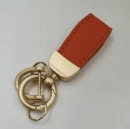 brelok-skorzany-do-kluczy-z-obrotowym-pierscieniem-85-cm-pomaranczowy