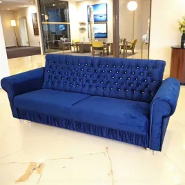 sofa-wersalka-rozkladana-z-pojemnikiem-na-posciel-pikowana-chesterfield