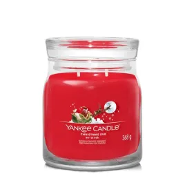 yankee-candle-signature-srednia-swieca-w-sloiku-christmas-eve-368g