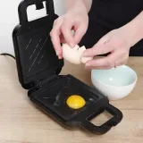 opiekacz-ideal-ik2500-bezpieczenstwo-automatyczny-wylacznik-nienagrzewajace-sie-uchwyty-nozki-antyposlizgowe-termoizolowana-obudowa-wylacznik-bezpieczenstwa-zabezpieczenie-przed-przegrzaniem